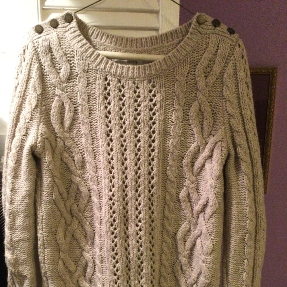 Women’s clothing. Warm women’s sweater.